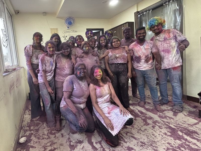 CodeMax team covered in colours celebrating Holi at the Fatorda office